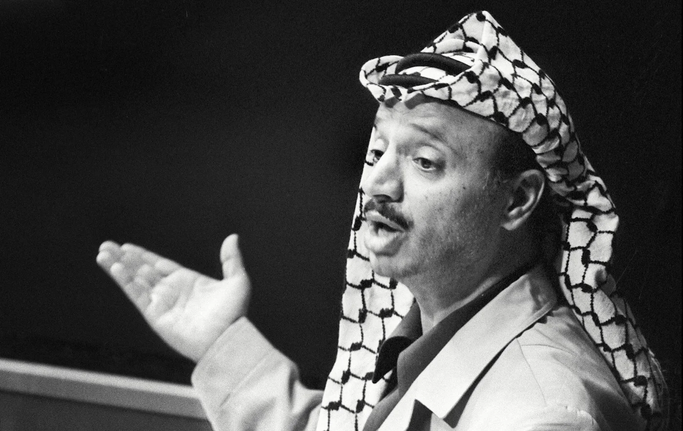 PLO leader Yasser Arafat speaks before the UNGA in New York on 13 November 1974 (AFP)